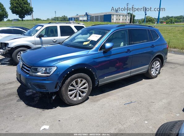 3VV3B7AX8JM047238 2018 VOLKSWAGEN TIGUAN Blue Vista tres cuartos delantera izquierda
