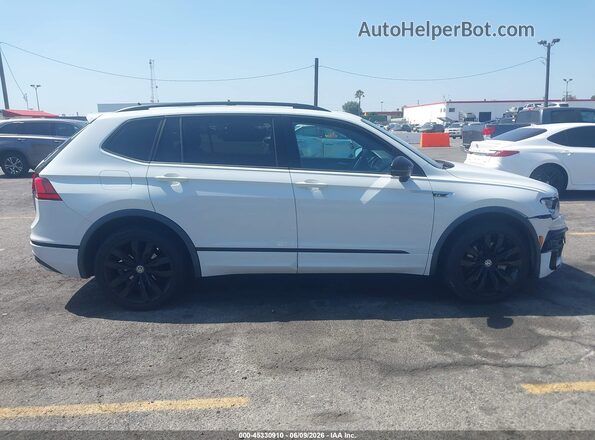 3VV3B7AX8MM020867 2021 VOLKSWAGEN TIGUAN White Vista interior trasera