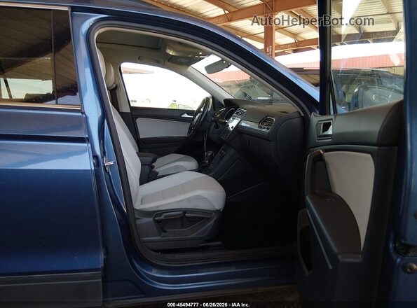 3VV3B7AX9KM194086 2019 VOLKSWAGEN TIGUAN Blue Vista interior delantera