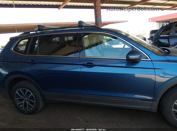 3VV3B7AX9KM194086 2019 VOLKSWAGEN TIGUAN Blue Vista interior trasera