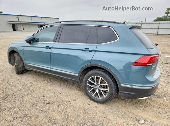 3VV3B7AX9LM058607 2020 VOLKSWAGEN TIGUAN Blue Trasero izquierdo