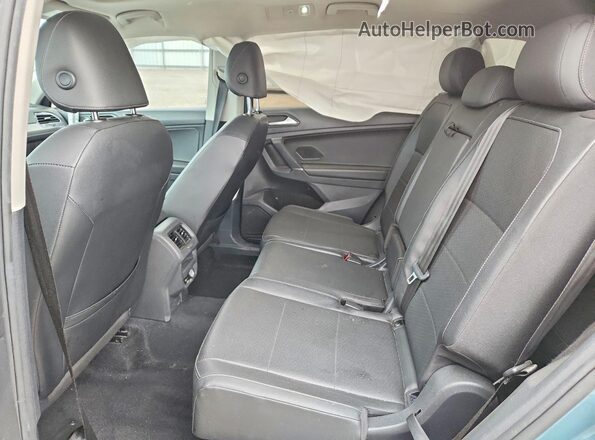 3VV3B7AX9LM058607 2020 VOLKSWAGEN TIGUAN Blue Vista interior trasera