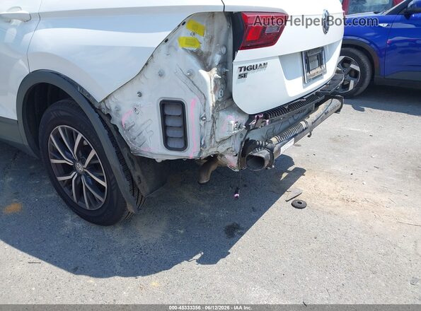3VV3B7AXXKM199152 2019 VOLKSWAGEN TIGUAN Белый Вид спереди