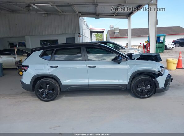 3VV3C7B25TM044204 2026 VOLKSWAGEN TAOS Blue Vista interior trasera