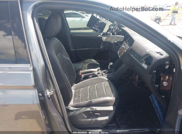 3VV4B7AX0RM056225 2024 VOLKSWAGEN TIGUAN Gray Vista interior delantera