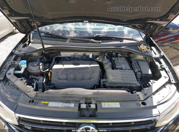 3VV8B7AX1NM169256 2022 VOLKSWAGEN TIGUAN Black Вид ззаду