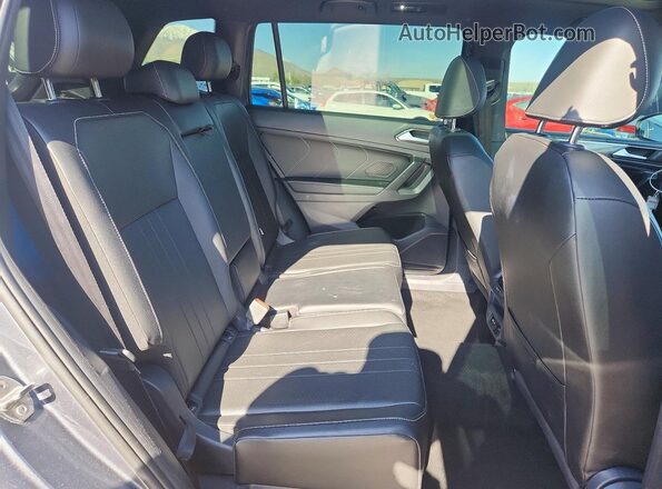 3VV8B7AX4PM085628 2023 VOLKSWAGEN TIGUAN Серый Вид задней части салона