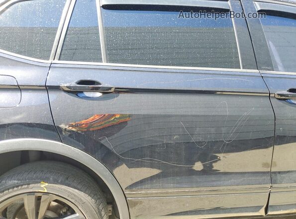 3VVCB7AX4PM015055 2023 VOLKSWAGEN TIGUAN Black 