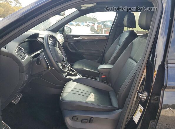 3VVCB7AX4PM070461 2023 VOLKSWAGEN TIGUAN Black Vista interior delantera