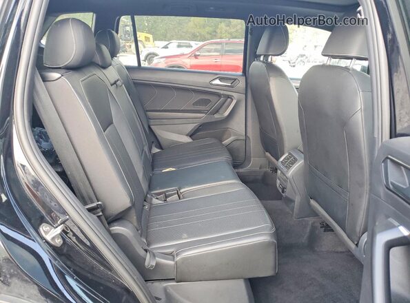 3VVCB7AX4PM070461 2023 VOLKSWAGEN TIGUAN Black Vista interior trasera