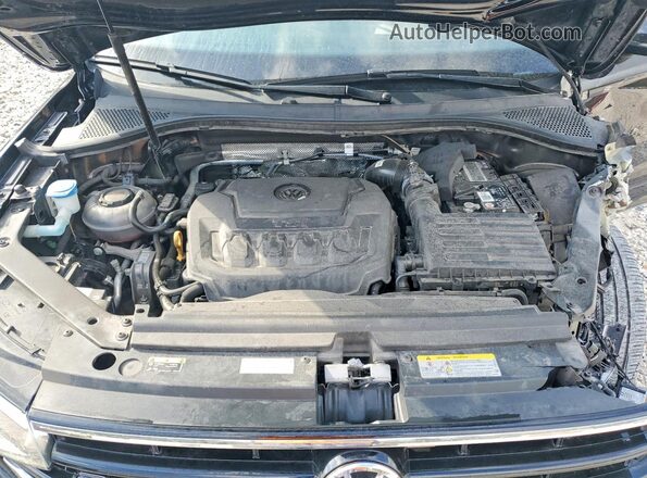 3VVCB7AX4PM070461 2023 VOLKSWAGEN TIGUAN Black Vista del compartimento del motor