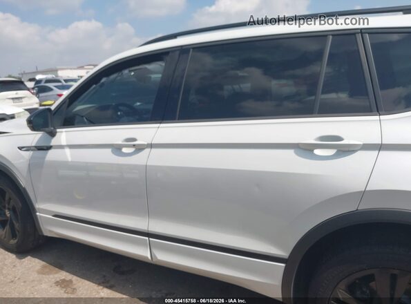 3VVCB7AX4PM139150 2023 VOLKSWAGEN TIGUAN White Вид задньої частини салону