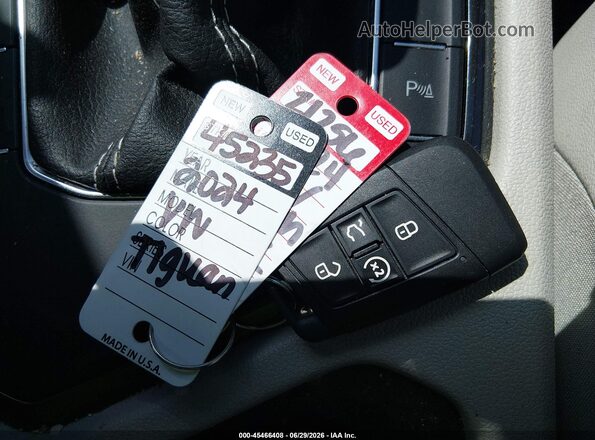 3VVCB7AX6RM198381 2024 VOLKSWAGEN TIGUAN Black Առջևի վահանակի տեսք