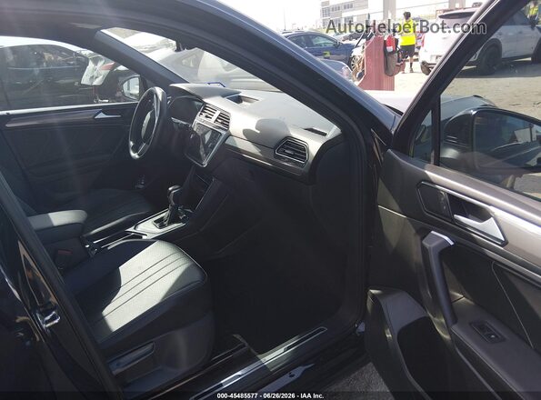 3VVCB7AX9PM140505 2023 VOLKSWAGEN TIGUAN Black Front interior view