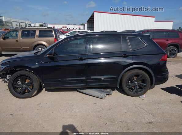 3VVCB7AX9PM140505 2023 VOLKSWAGEN TIGUAN Black Rear interior view