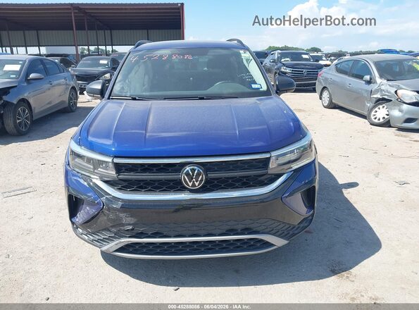 3VVCX7B21PM322378 2023 VOLKSWAGEN TAOS Blue Vista del salpicadero