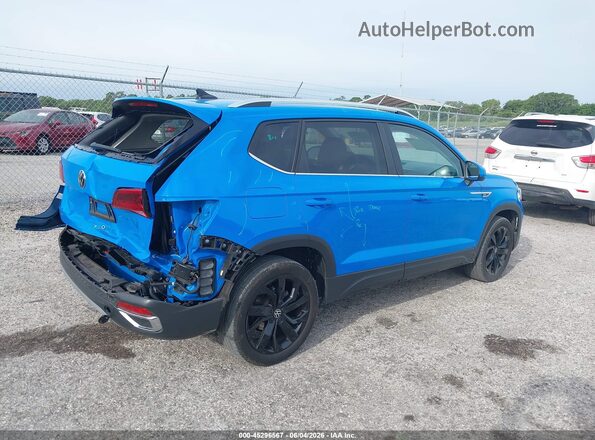 3VVEX7B22RM106583 2024 VOLKSWAGEN TAOS Blue Trasero derecho