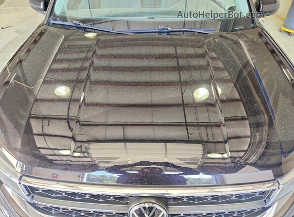 3VVEX7B2XPM371362 2023 VOLKSWAGEN TAOS Black Vista del compartimento del motor