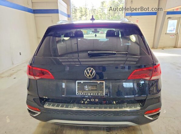 3VVEX7B2XPM371362 2023 VOLKSWAGEN TAOS Black Vista trasera