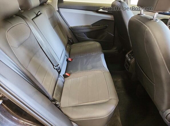3VVEX7B2XPM371362 2023 VOLKSWAGEN TAOS Black Vista interior trasera