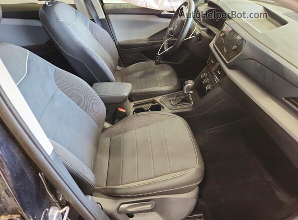 3VVEX7B2XPM371362 2023 VOLKSWAGEN TAOS Black Vista interior delantera