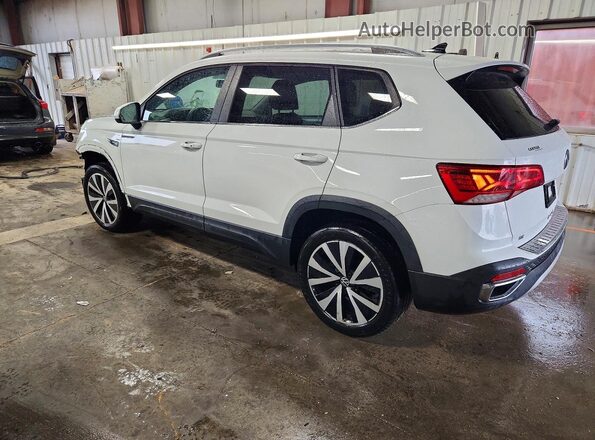 3VVLX7B22NM063221 2022 VOLKSWAGEN TAOS White Trasero izquierdo