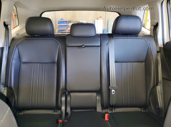 3VVMB7AX2RM063029 2024 VOLKSWAGEN TIGUAN White Rear seats view