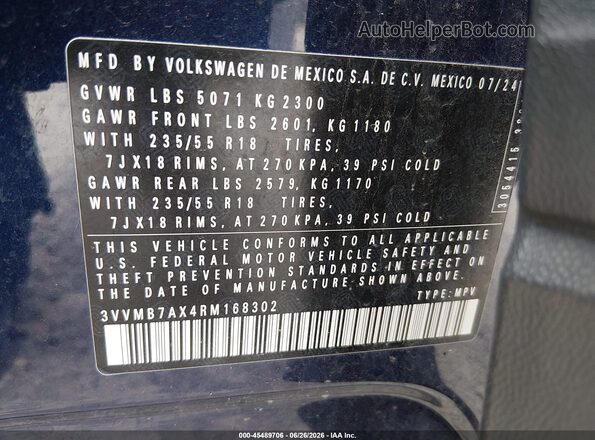 3VVMB7AX4RM168302 2024 VOLKSWAGEN TIGUAN Blue Vista del compartimento del motor