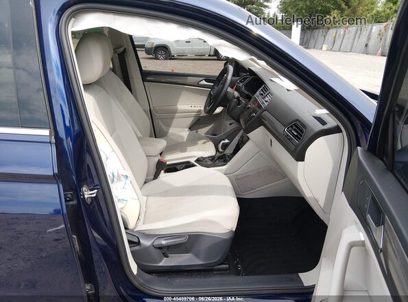 3VVMB7AX4RM168302 2024 VOLKSWAGEN TIGUAN Blue Vista interior delantera