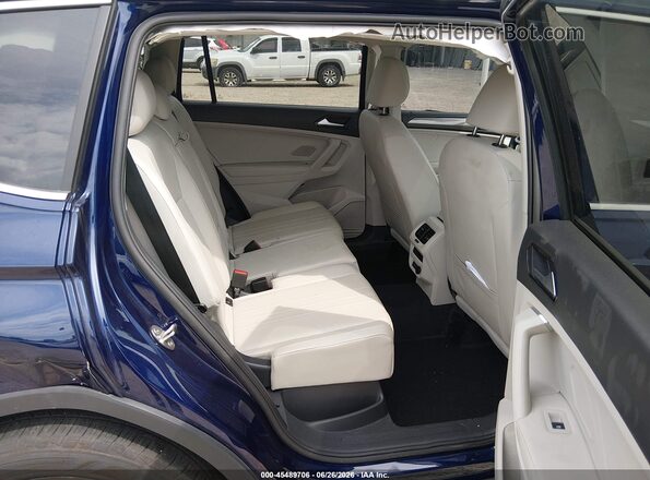 3VVMB7AX4RM168302 2024 VOLKSWAGEN TIGUAN Blue Vista de la etiqueta del VIN