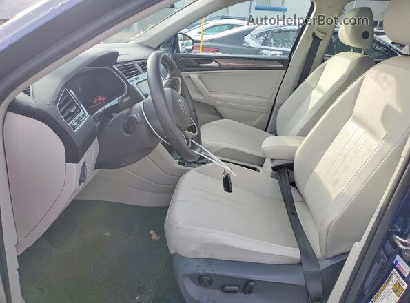 3VVMB7AX7PM070104 2023 VOLKSWAGEN TIGUAN Blue Vista interior delantera