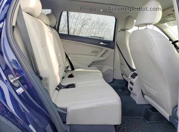 3VVMB7AX7PM070104 2023 VOLKSWAGEN TIGUAN Blue Vista interior trasera