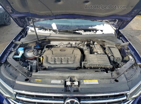 3VVMB7AX7PM070104 2023 VOLKSWAGEN TIGUAN Blue Vista del compartimento del motor