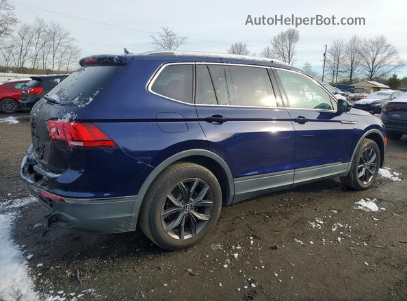 3VVMB7AX7PM070104 2023 VOLKSWAGEN TIGUAN Blue Trasero derecho