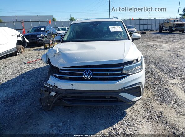 3VVNB7AX2PM027861 2023 VOLKSWAGEN TIGUAN White Vista interior trasera