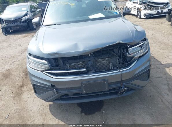 3VVNB7AX8PM042266 2023 VOLKSWAGEN TIGUAN Золотой Вид спереди