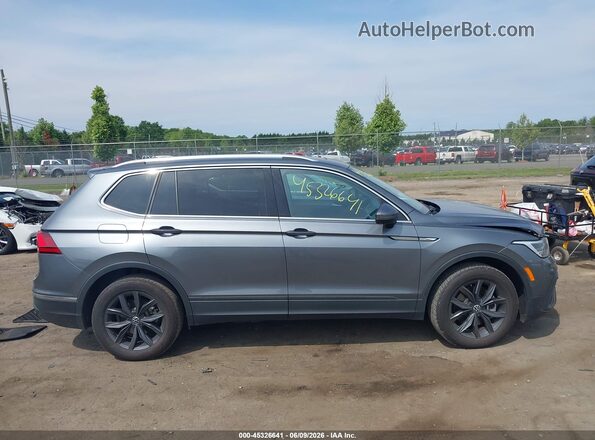 3VVNB7AX8PM042266 2023 VOLKSWAGEN TIGUAN Золотой Вид задней части салона