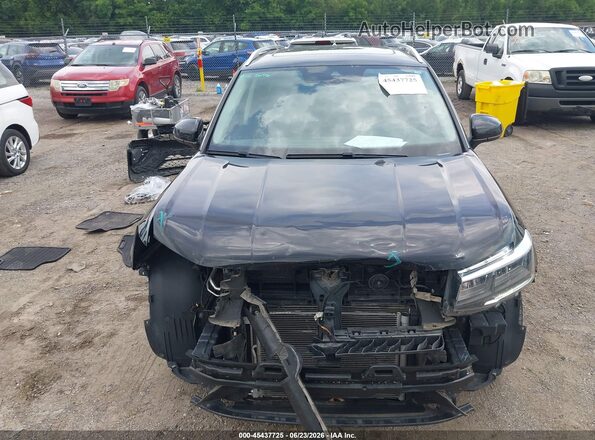 3VVPX7B29NM028631 2022 VOLKSWAGEN TAOS Black Widok wnętrza z tyłu