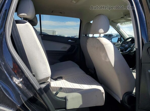 3VVRB7AX9PM063189 2023 VOLKSWAGEN TIGUAN Black Widok wnętrza z tyłu