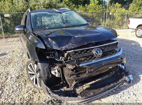 3VVRX7B22NM088856 2022 VOLKSWAGEN TAOS Black Vista frontal