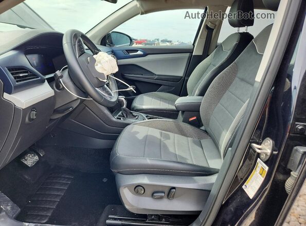 3VVSX7B28PM313382 2023 VOLKSWAGEN TAOS Black Front interior view