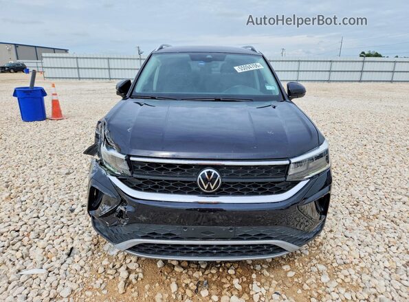 3VVSX7B28PM313382 2023 VOLKSWAGEN TAOS Black Front view