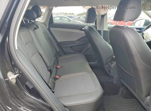 3VVUX7B22PM370671 2023 VOLKSWAGEN TAOS Black Vista interior trasera