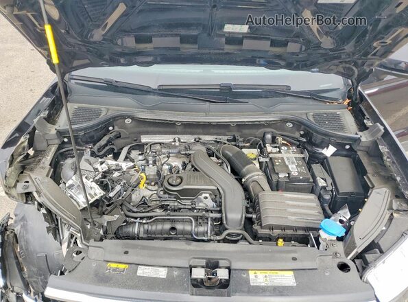 3VVUX7B22PM370671 2023 VOLKSWAGEN TAOS Black Vista del compartimento del motor