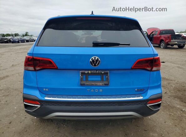 3VVUX7B24RM030456 2024 VOLKSWAGEN TAOS Blue Вид ззаду
