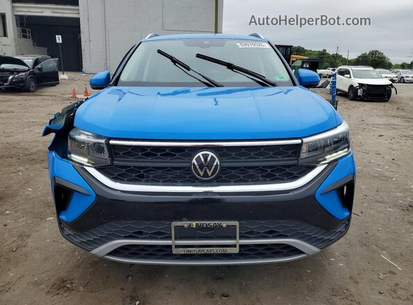3VVUX7B24RM030456 2024 VOLKSWAGEN TAOS Blue Вид спереду