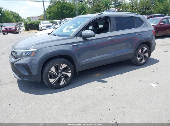3VVUX7B25RM030482 2024 VOLKSWAGEN TAOS Gray Vista tres cuartos delantera izquierda