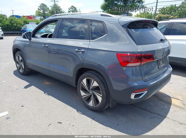 3VVUX7B25RM030482 2024 VOLKSWAGEN TAOS Gray Trasero izquierdo