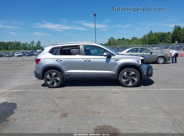 3VVVX7B24RM049898 2024 VOLKSWAGEN TAOS Silver Rear interior view