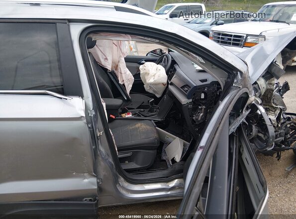 3VVVX7B27RM041097 2024 VOLKSWAGEN TAOS Silver Vista interior delantera